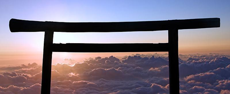 Oriental symbol with sky and clouds
